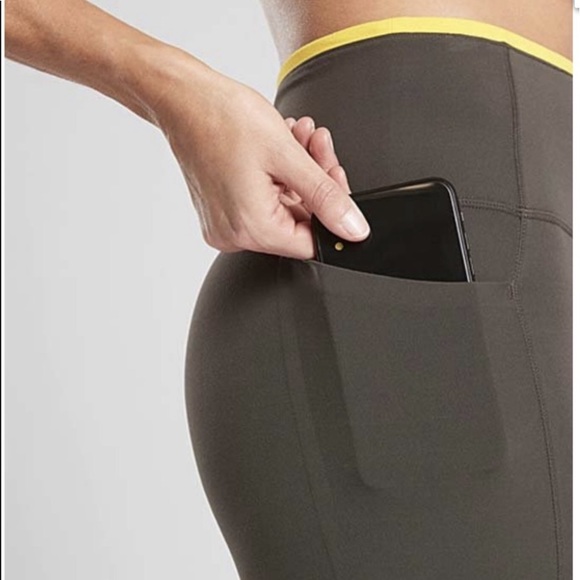 Athleta Revelation Laser Cut 7/8 Tight In Powervita with Pocket in Olive, Size M - Picture 3 of 8